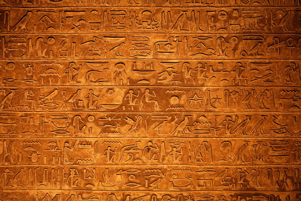 Egyptian Hieroglyphics on a beige stone
